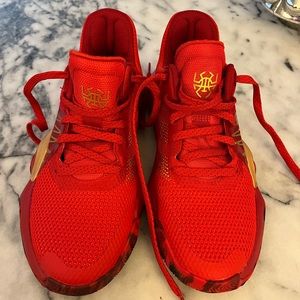 Boys red Adidas basketball shoes Marvel edition. Size 5